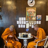 Monks joining me in an air conditioned coffee shop